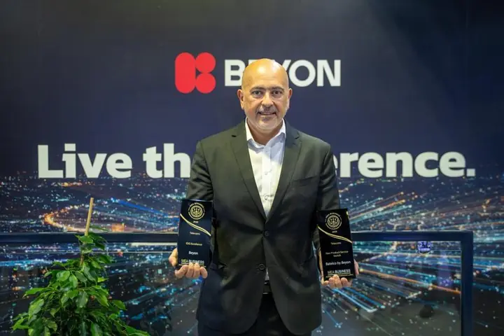 Beyon with two awards on the Beyon stand