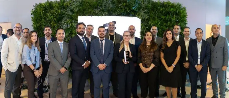 The Ericsson team celebrates their award at GITEX