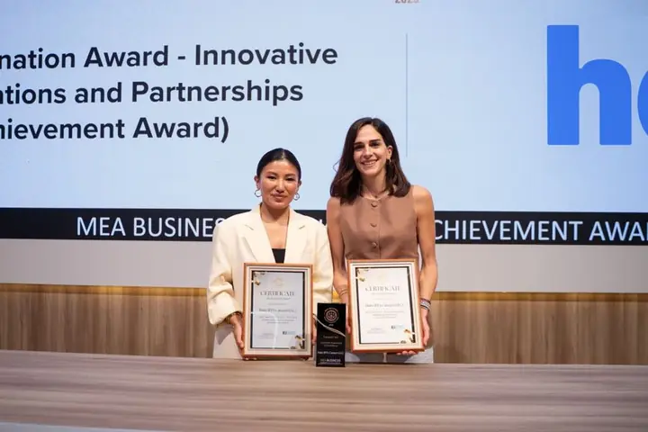 Hala (RTA Careem) with two certificates and a trophy