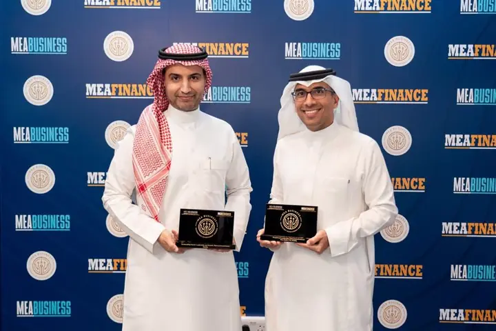 Mobily executives with two MEA Business awards